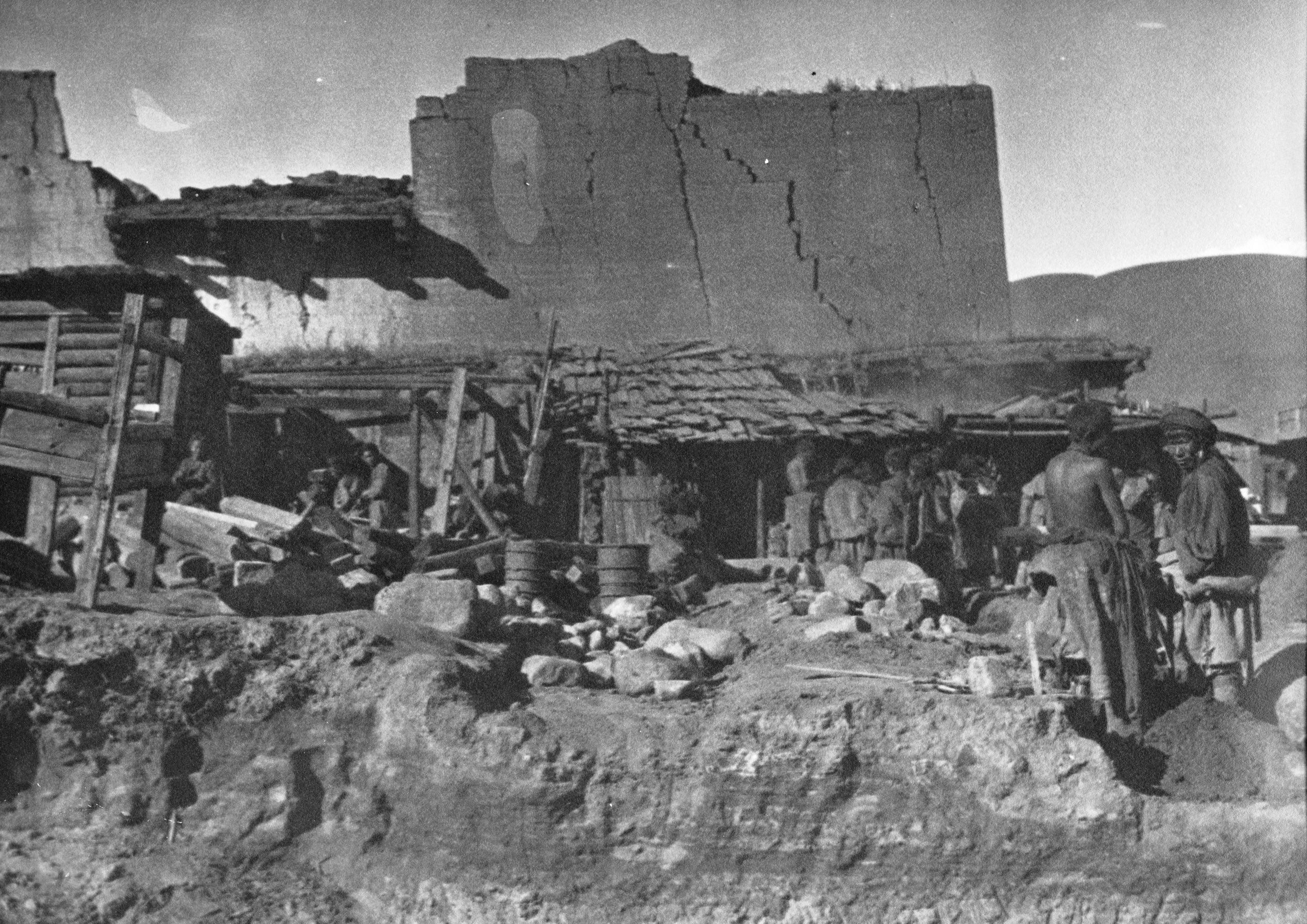 Picture of local people amongst the ruins of Lu-ho hsien after the earthquake