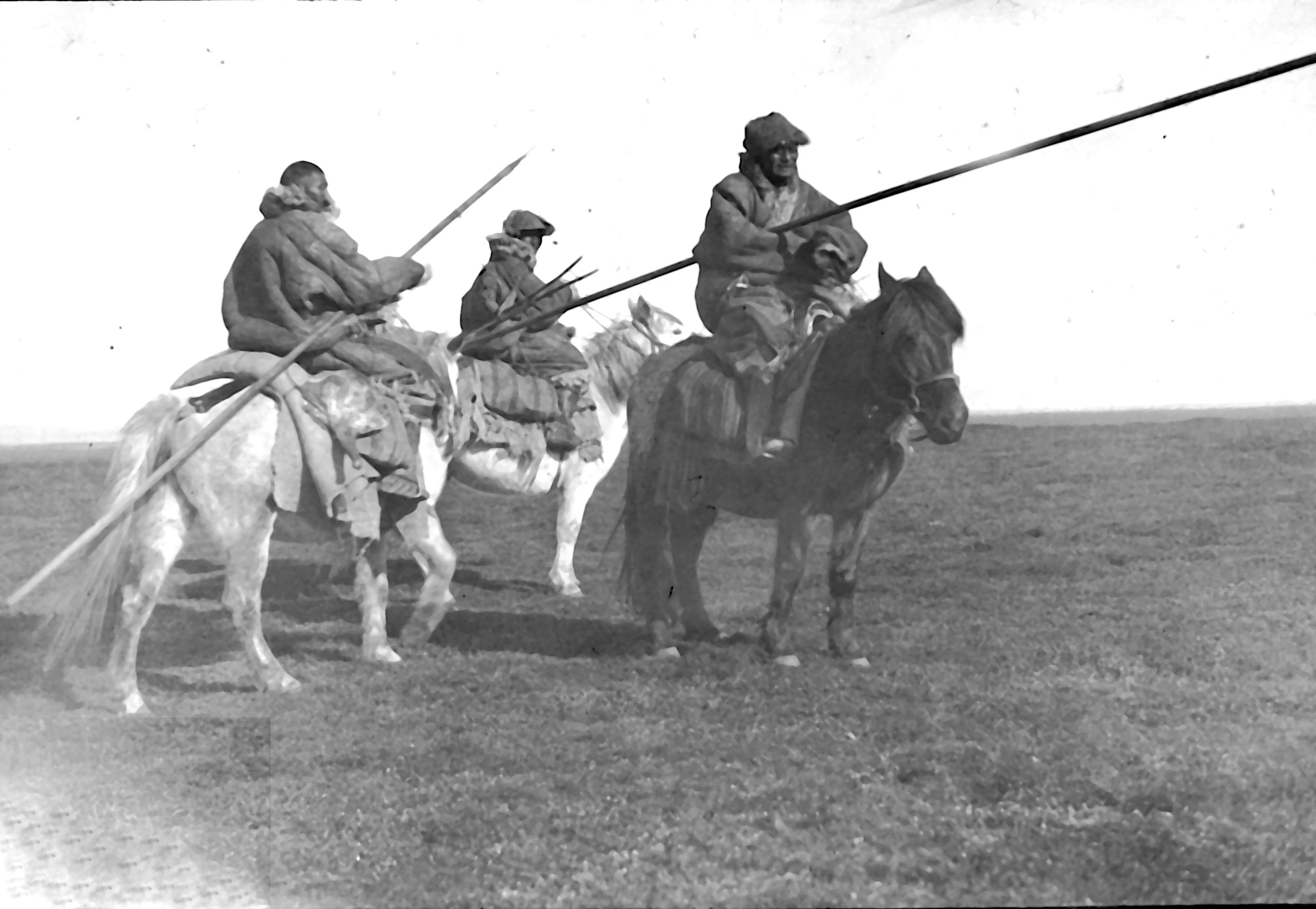 Picture of Golok horseman with their spears in the Tibetan borderlands